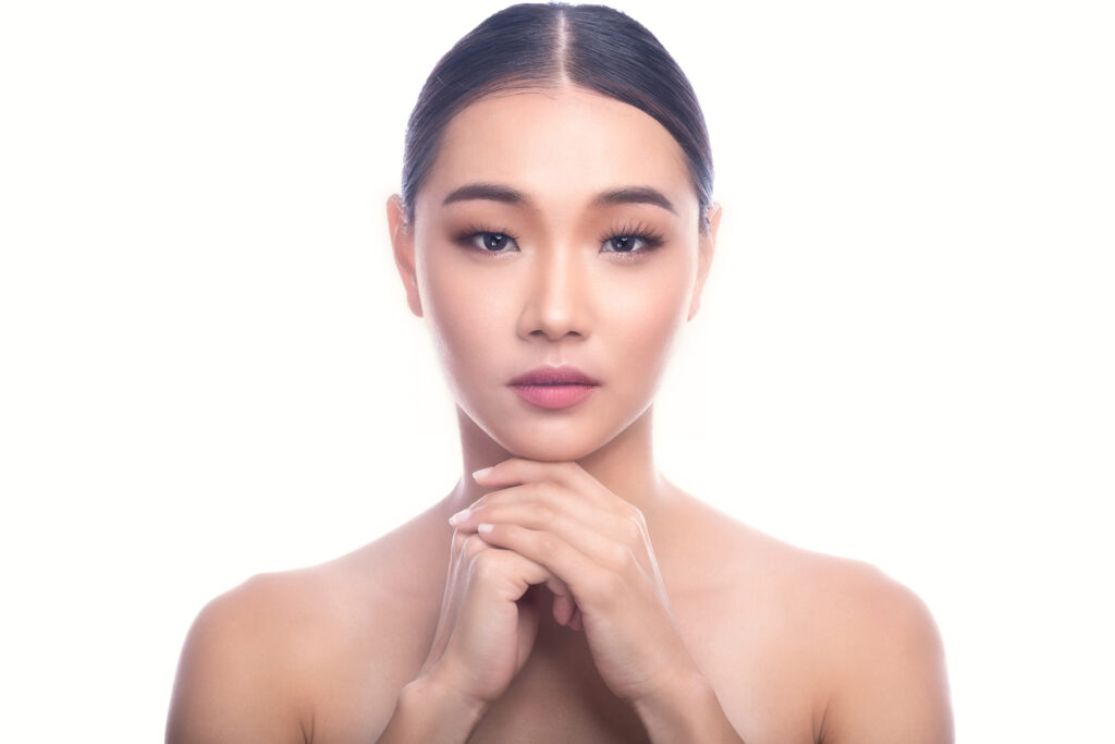 Natural, balanced complexion reflecting inner vitality at an aesthetics face & body spa