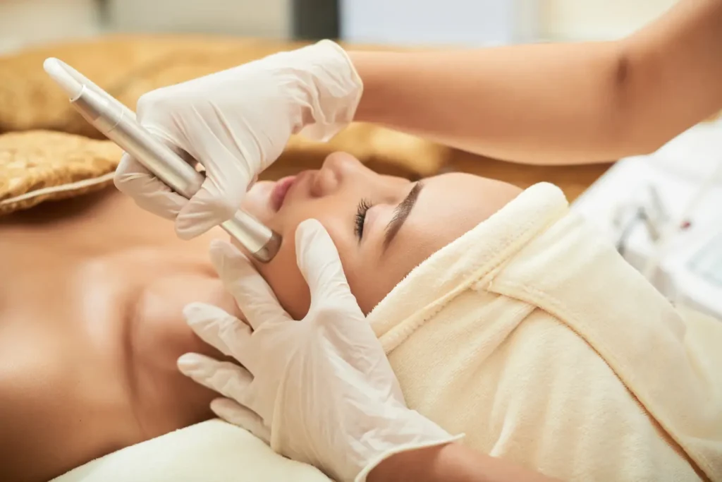 Professional skin renewal treatment performed with precision facial technology