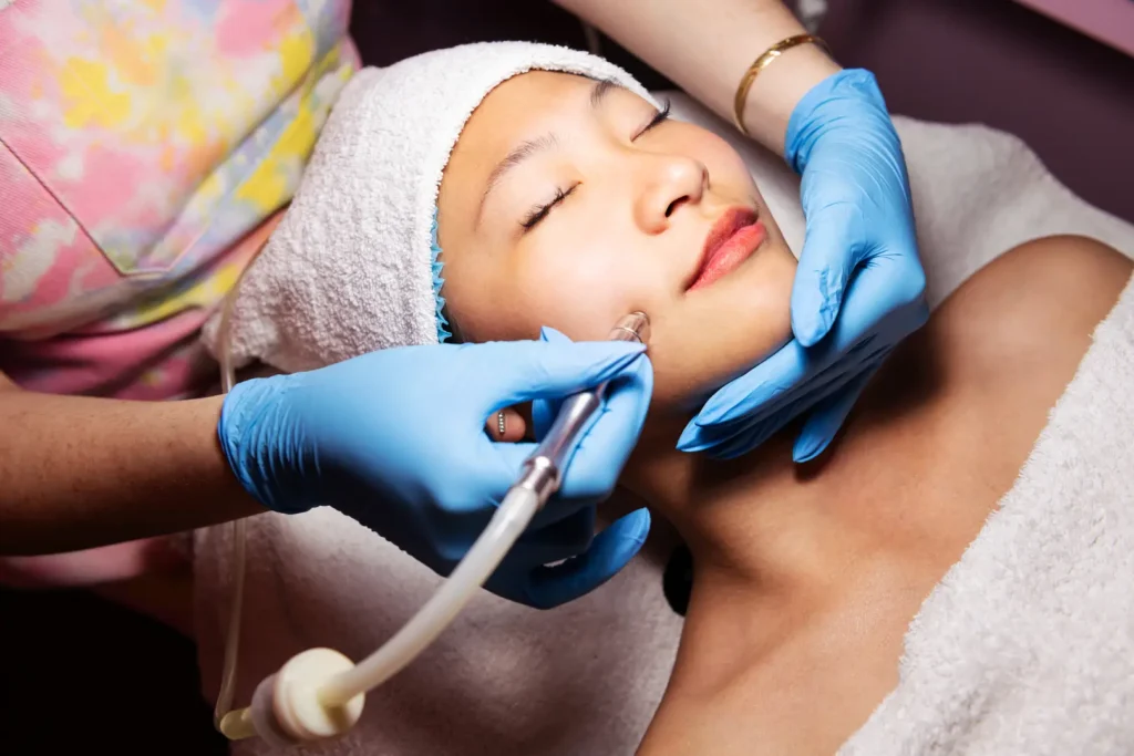 Client receiving specialised care at an aesthetics face & body spa